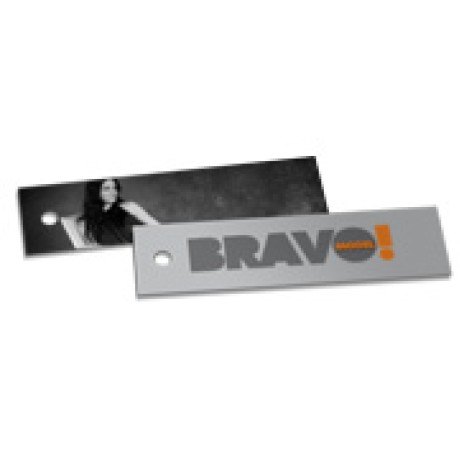 TAGS TAGS ESPECIAIS COUCHE 300G VERNIZ UV TOTAL FRENTE 91X25MM Colorido frente e preto e branco verso - 2000 un.